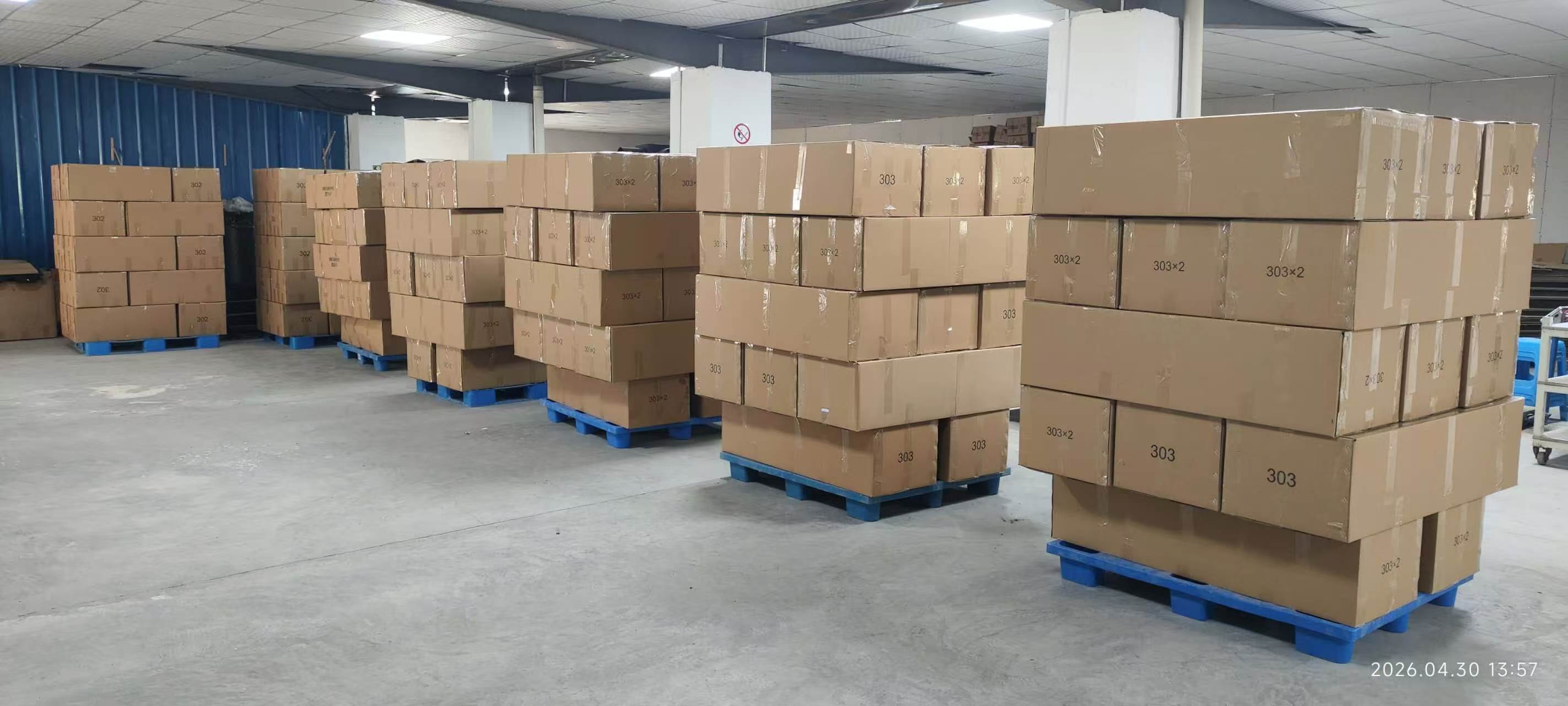 Palletized cartons of prepared traffic signal products in the factory